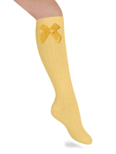 Meias caneladas altas com laço de cetim volumoso Mustard